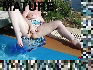 Mature redhead redxxx fucking and masturbating poolside