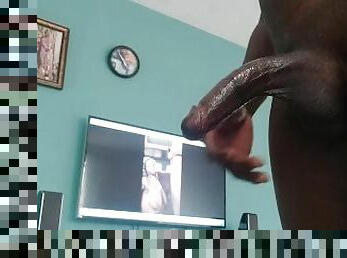 Watching porn and stroking my hard black dick