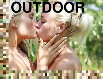 Cute blonde enjoying raw outdoor pleasures