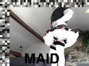 Sissy Staci in her maid uniform cleaning the house