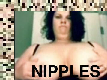 Sexy BBW with huge tits shows off her big nipples for your pleasure.