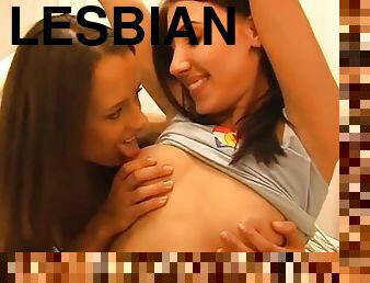 Two teen lesbians playing with their wet pussies