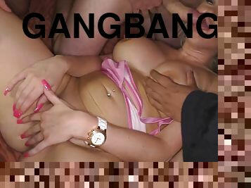 Hot English sluts enjoy a gangbang party in a sex club