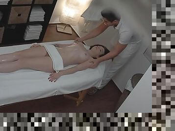 Fully naked girl enjoys hot massage
