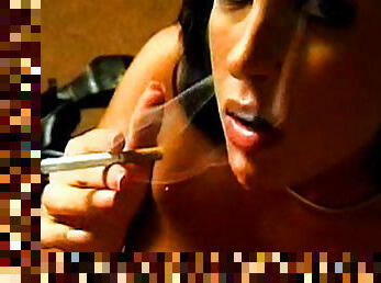 Smoking brunette gives deep blowjob