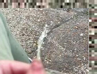 Foreskin  penis piss at river at sunny