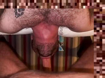 Hairy hunk gets throat-fucked by massive dick