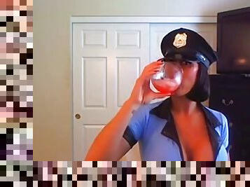 Busty police lady toys on camera