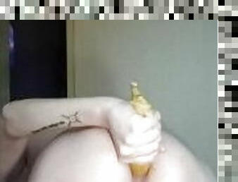 A hot girl, standing with cancer, plays with her developed anal and a big banana, which she pu