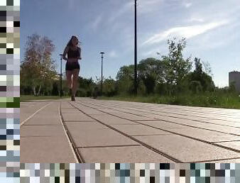 SFW. A girl in a sexy suit is engaged in fitness. Running and squats