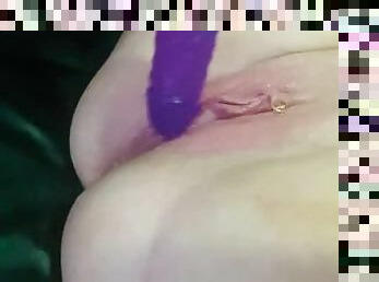 squirting on the couch with my purple dildo