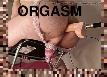 Fucking machine interrupts anal orgasm in pink chastity cage