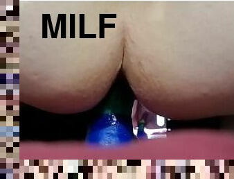 Milf riding rainbow dildo.