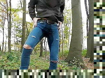 wetting my destroyed jeans in the forest