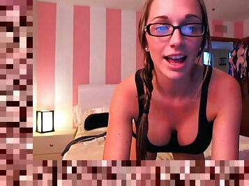 Webcam girl pours a martini and shakes her ass