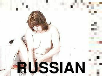 Russian mom washes and jerks off in the bath