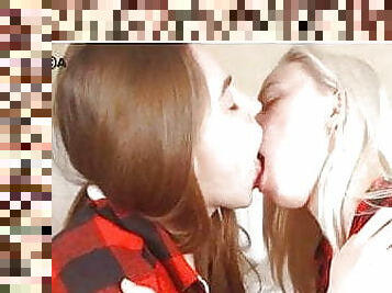 Young lesbo girls kiss with immense passion