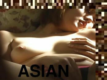 Asian teen rubs her pussy