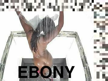 Ebony model taking a shower in a photoshoot