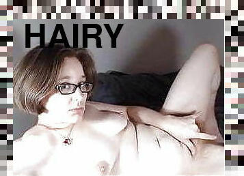 Hairy natural girl plays for you.