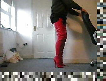 Standing in red crotch high ballet Boots