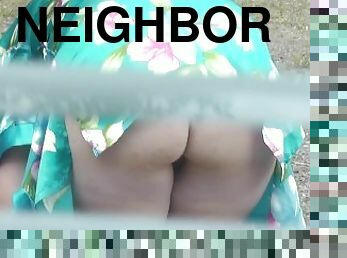 Neighbor in bathrobe without panties and bra dries washing courtyard, neighbour watching out window