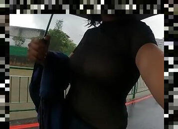 Taking a Walk in The Rain With A Sheer Top Big Boobs Reveal