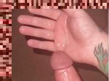Solo male cums in hand