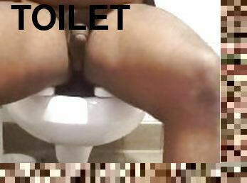 Jacking off on the toilet in public rest room