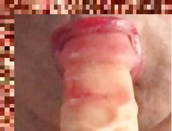 Sissy husband wearing red lipstick sucking a dildo