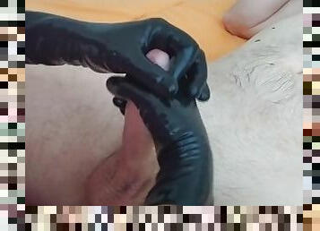 Cock massage in black latex gloves makes him cum 4 times