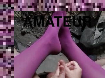 POV video of NightMiss feet in purple pantyhose giving sloppy handjob