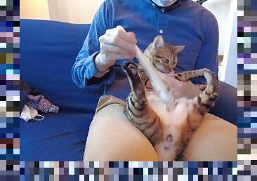 The pussy being massaged is in full view .................. Looks very pleasant.