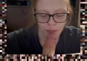 Red head with glasses gives great blowjob