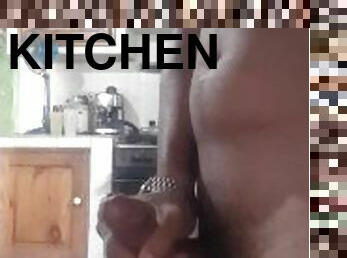 horny masturbating in the kitchen