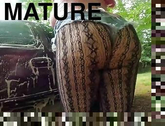 Gigantic fake tits crossdresser car wash