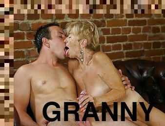 Perverted granny with saggy tits gets boned on leather couch