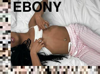 Horny ebony Kira Noir masturbates passionately in bed