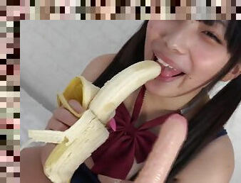 Asian Girl Plays With Banana