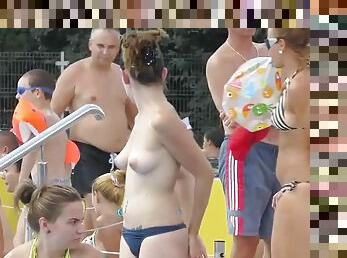 alluring topless 18-year-olds tanning wearing micro thongs