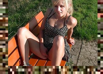 blonde masturating in the park on the bench before handjob