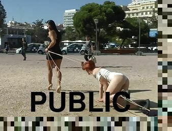 Redhead bitch humiliated in public lezdom