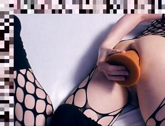 Sexy shemale in fishnets fisting and dildoing her ass