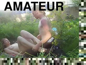 Amateur couple makes love outdoor