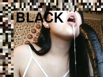 Dark Haired Cam Chic Slobbers On A Long Black Dong