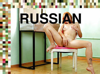 Russian redhead Marta Lovely fucks her cunt solo