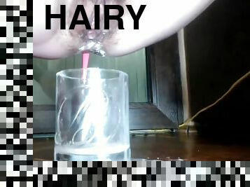 Hairy oozing pussy and dildo in asshole