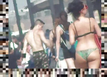 Nice young woman in green bikini voyeur clip