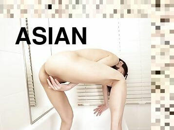 Solo Asian MILF Remy Okuda hotly masturbates in the bathroom in 4K