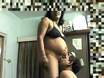 Indian pregnant chick is giving a nice blowjob